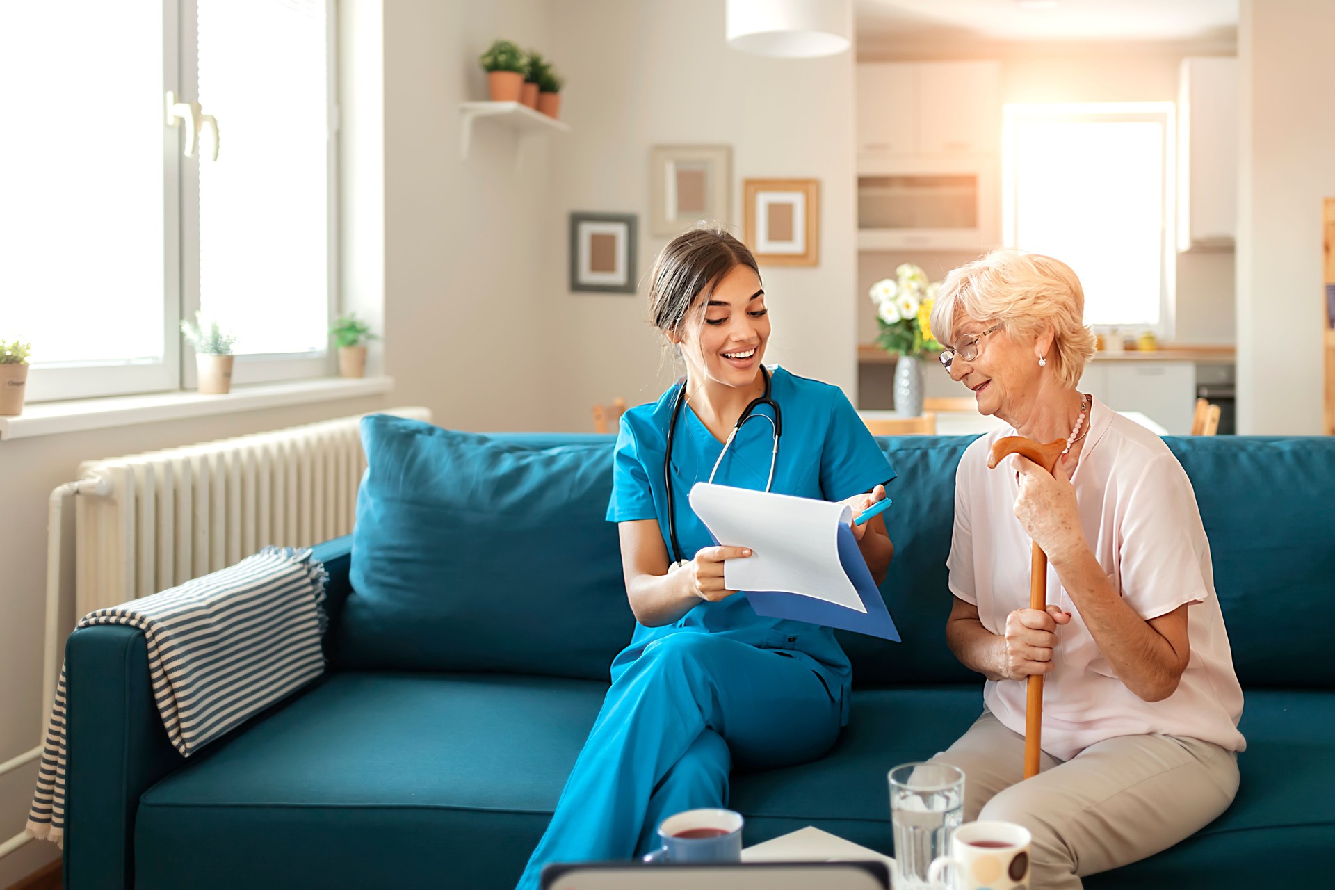 Nurse Checking Senior Woman at Home